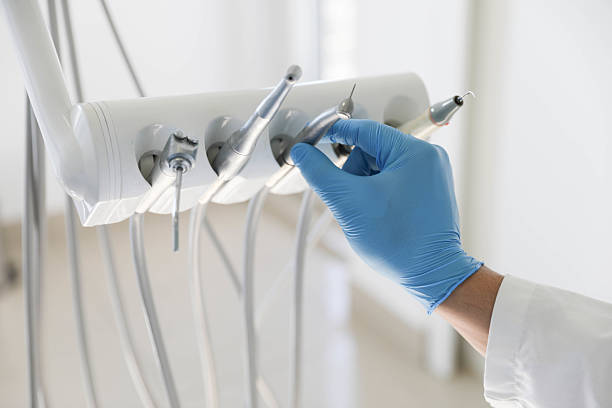 Professional Dental Crowns And Bridges technician working in Roland, OK